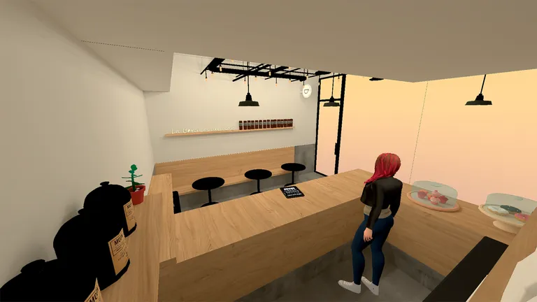 Wide view of the cafe with Rosa behind the counter and bar stools by the window